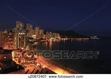 Stock Photo - "Illuminated Beach Resort, Honolulu, Hawaii, U. S. A. ". Fotosearch