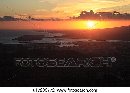 Stock Image - "Sunset In Pearl Harbor, Hawaii, U. S. A. ". Fotosearch