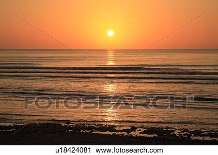 Stock Image - "Morning Sun In Beach, Maui, Hawaii, U. S. A. ". Fotosearch