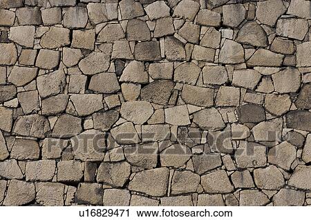 Stock Image - Japanese Traditional Stone Wall. Fotosearch