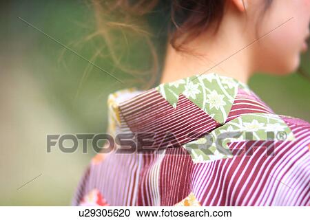 Stock Image - Rear View of Woman in Kimono. Fotosearch