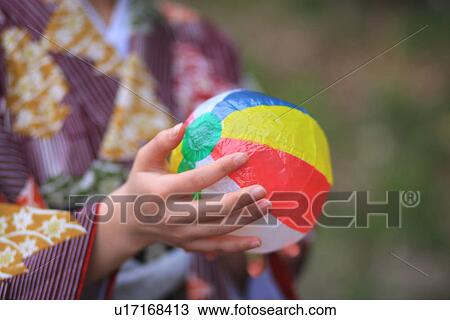 Woman in Kimono Holding Paper Ball View Large Photo Image Stock Image - Woman in Kimono Holding Paper Ball. Fotosearch