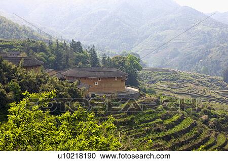 Asia, China, Fujian, Nanjing County, Shuyang Town, Shangban Village, Tianloukeng Tulou Cluster View Large Photo Image Stock Image - Asia, China, Fujian, Nanjing County, Shuyang Town, Shangban Village, Tianloukeng Tulou Cluster. Fotosearch