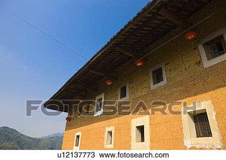 Asia, China, Fujian, Nanjing County, Shuyang Town, Shangban Village, Tianloukeng Tulou Cluster View Large Photo Image Stock Image - Asia, China, Fujian, Nanjing County, Shuyang Town, Shangban Village, Tianloukeng Tulou Cluster. Fotosearch