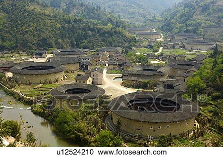 Stock Image - Asia, China, Fujian, Nanjing County, Shuyang Town, Hekheng Village, Hekheng Tulou Cluster. Fotosearch