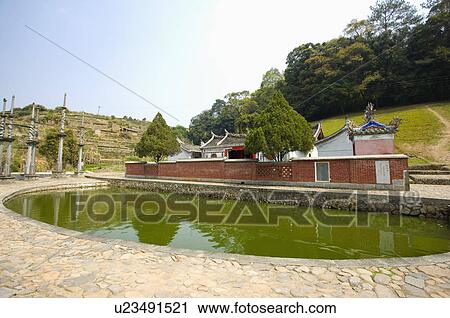 Stock Image - Asia, China, Fujian, Nanjing County, Shuyang Town, Taxia Village, Taxia Tulou Cluster. Fotosearch