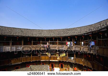 Asia, China, Fujian, Nanjing County, Shuyang Town, Shangban Village, Tianloukeng Tulou Cluster View Large Photo Image Stock Image - Asia, China, Fujian, Nanjing County, Shuyang Town, Shangban Village, Tianloukeng Tulou Cluster. Fotosearch