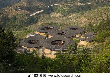 Asia, China, Fujian, Nanjing County, Shuyang Town, Shangban Village, Tianloukeng Tulou Cluster View Large Photo Image Stock Photograph - Asia, China, Fujian, Nanjing County, Shuyang Town, Shangban Village, Tianloukeng Tulou Cluster. Fotosearch