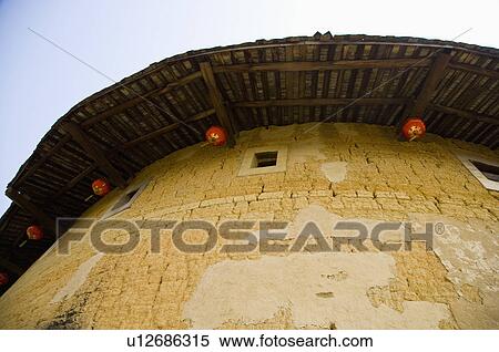 Stock Photography - Asia, China, Fujian, Nanjing County, Shuyang Town, Shangban Village, Tianloukeng Tulou Cluster. Fotosearch
