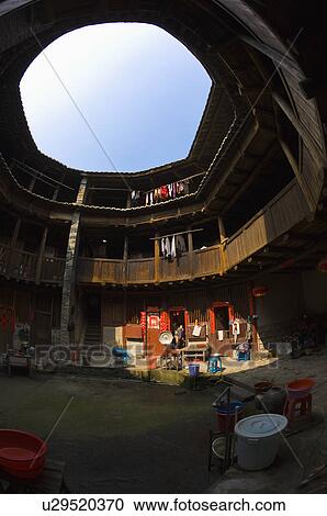 Stock Image - Asia, China, Fujian, Yongding County, Hukeng, Hongkeng Village, Hongkeng Tulou Cluster, Cultural Village. Fotosearch