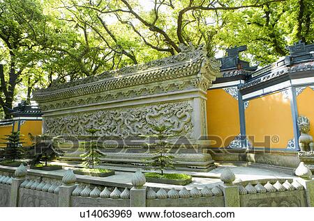 Stock Photo - Asia, China, Zhejiang Province, Putuoshan, Fayu Temple Scenic Area, Fayu Temple, Nine dragon walls. Fotosearch