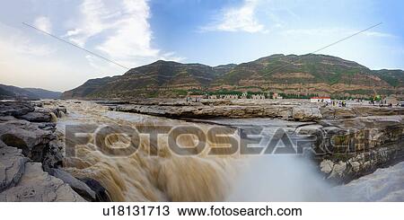 Stock Image - Asia, China, Shanxi, Jixian County, Yellow River, Hukou Waterfall. Fotosearch