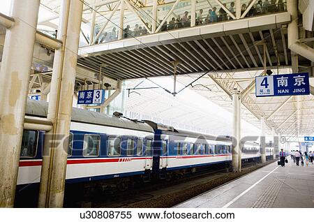 Stock Photography - Asia, China, Jiangsu Province, Nan Jing, Nanjing Railway Station, Railroad Station Platform. Fotosearch