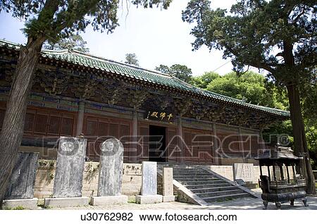 Stock Image - China, Shandong, Changqing, Divine Rock Temple, Thousand-Buddha's Hall. Fotosearch