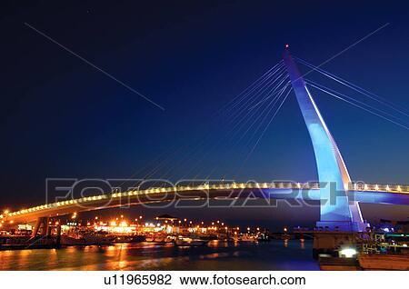Stock Image - Bridge across a river, Lover's Bridge, Danshui Fisherman's Wharf, Taipei, Taiwan. Fotosearch