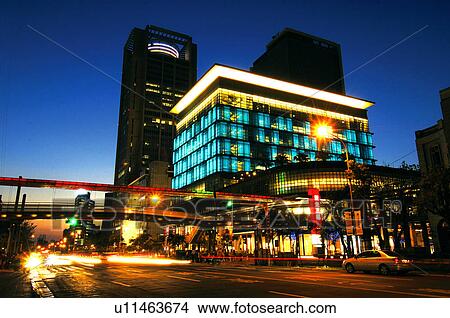Building lit up in a city at night, Xinyi District, Taipei, Taiwan View Large Photo Image Picture - Building lit up in a city at night, Xinyi District, Taipei, Taiwan. Fotosearch