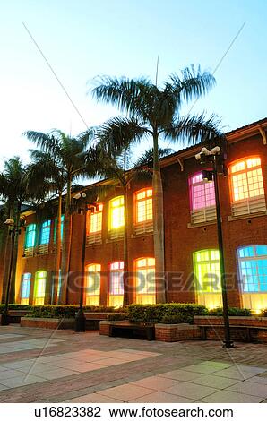 Stock Image - Museum lit up at night, Museum Of Contemporary Art, Taipei, Taiwan. Fotosearch