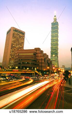 Stock Photograph - Skyscraper in a city at night, Taipei 101, Taipei, Taiwan. Fotosearch