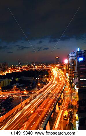 Traffic in a city at night, Taipei, Taiwan View Large Photo Image Stock Image - Traffic in a city at night, Taipei, Taiwan. Fotosearch