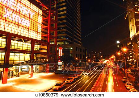 Stock Photo - Traffic in a city at night, Xinyi District, Taipei, Taiwan. Fotosearch