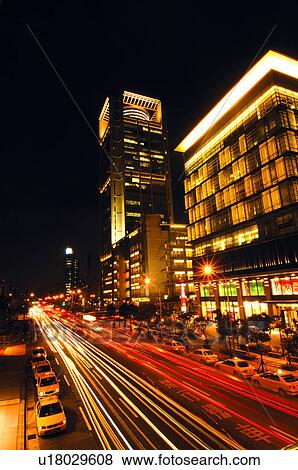 Stock Photo - Traffic in a city at night, Xinyi District, Taipei, Taiwan. Fotosearch