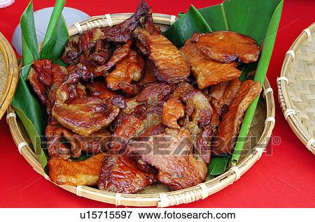 Stock Photo - Close-up of meat in a wicker basket, Taiwan. Fotosearch