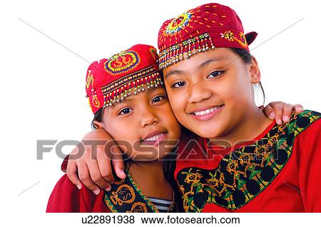 Stock Photo - Portrait of two Taiwanese girls smiling, Taiwan. Fotosearch