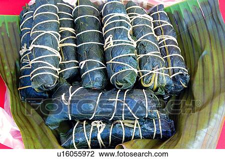Rice dumplings wrapped in leaves, Taiwan View Large Photo Image Stock Image - Rice dumplings wrapped in leaves, Taiwan. Fotosearch