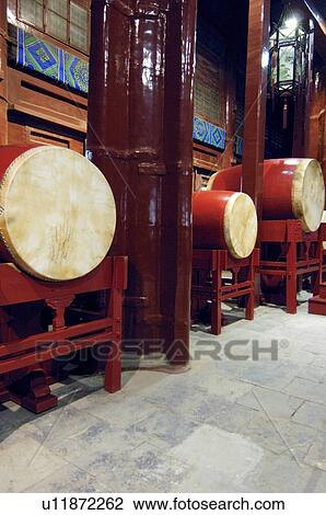 Stock Image - Drums on stools, Beijing, China. Fotosearch
