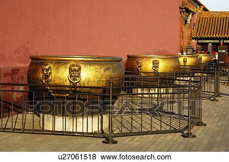 Metallic pots in front of a building, Beijing, China View Large Photo Image Stock Photo - Metallic pots in front of a building, Beijing, China. Fotosearch