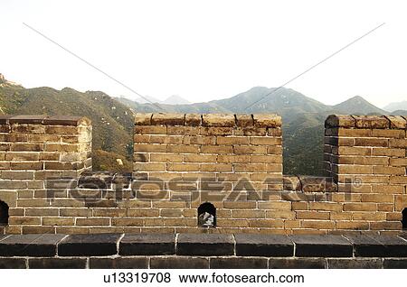 View of a mountain range from a historic wall, Great Wall Of China, China View Large Photo Image Stock Photo - View of a mountain range from a historic wall, Great Wall Of China, China. Fotosearch
