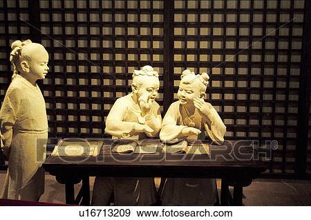 Chinese traditional statues at a table, Beijing, China View Large Photo Image Stock Photo - Chinese traditional statues at a table, Beijing, China. Fotosearch