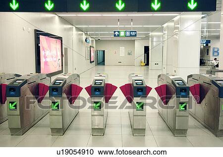 Stock Image - Afc gates in a subway station, Beijing, China. Fotosearch