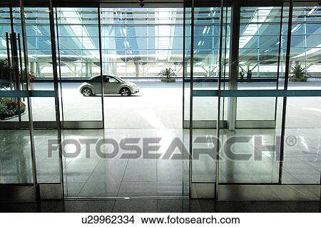 Picture - Car in front of the airport, Beijing, China. Fotosearch