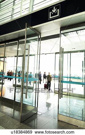 Passengers in the airport, Beijing, China View Large Photo Image Stock Photo - Passengers in the airport, Beijing, China. Fotosearch