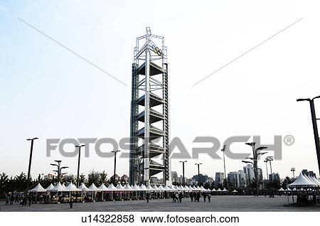 Stock Photo - People near a tower, Beijing Olympic Tower, Beijing, China. Fotosearch