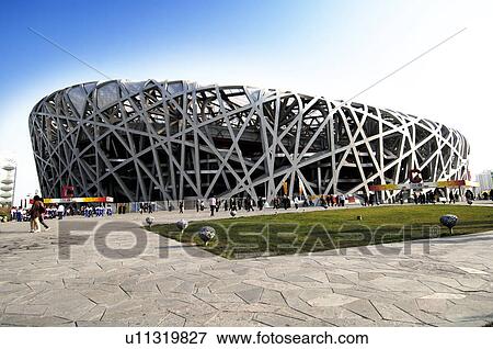 People walking near the olympic stadium, Beijing National Stadium, Beijing, China View Large Photo Image Stock Photo - People walking near the olympic stadium, Beijing National Stadium, Beijing, China. Fotosearch