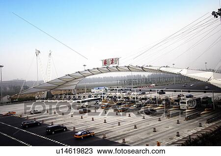 Stock Image - Vehicles on toll booth, Beijing, China. Fotosearch