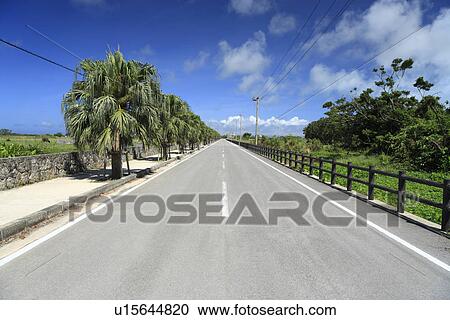 Stock Image - Road, Kuro Island, Taketomi, Okinawa, Japan. Fotosearch
