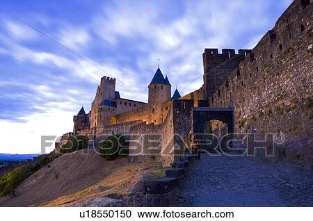 France, Languedoc, Carcassonne, Castle walls illuminated at night View Large Photo Image Stock Image - France, Languedoc, Carcassonne, Castle walls illuminated at night. Fotosearch