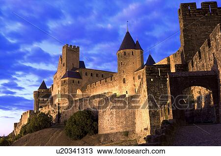 France, Languedoc, Carcassonne, Castle walls illuminated at night View Large Photo Image Stock Image - France, Languedoc, Carcassonne, Castle walls illuminated at night. Fotosearch