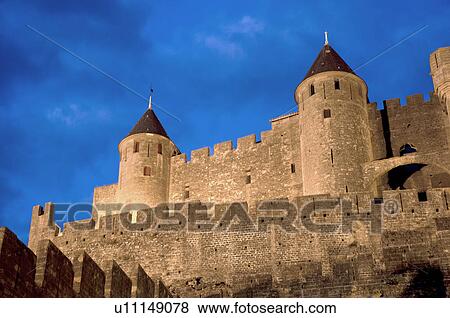 France, Languedoc, Carcassonne, Castle walls illuminated at night View Large Photo Image Stock Photo - France, Languedoc, Carcassonne, Castle walls illuminated at night. Fotosearch