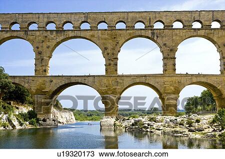 Pont du Gard Bridge, Roussillon, Languedoc, France View Large Photo Image Stock Image - Pont du Gard Bridge, Roussillon, Languedoc, France. Fotosearch