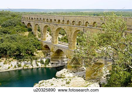 Pont du Gard Bridge, Roussillon, Languedoc, France View Large Photo Image Stock Image - Pont du Gard Bridge, Roussillon, Languedoc, France. Fotosearch