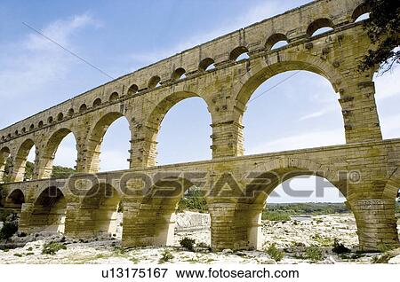 Pont du Gard Bridge, Roussillon, Languedoc, France View Large Photo Image Stock Photo - Pont du Gard Bridge, Roussillon, Languedoc, France. Fotosearch