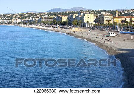 Stock Image - Beach and Coastline in Nice, Provence-Alpes-Cote d'Azur, France, Europe. Fotosearch