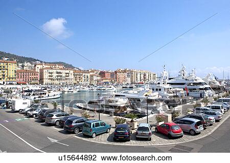 Stock Image - Fishing boats docked at a harbor, Nice, French Riviera, France, Europe. Fotosearch