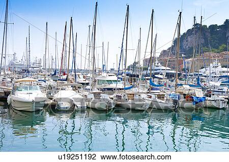 Fishing boats docked at a harbor, Nice, French Riviera, France, Europe View Large Photo Image Stock Image - Fishing boats docked at a harbor, Nice, French Riviera, France, Europe. Fotosearch