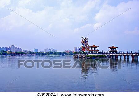 Stock Image - Taiwan, Kaohsiung, Zuoying, Dragon and Tiger Pagodas, Lotus Pond. Fotosearch