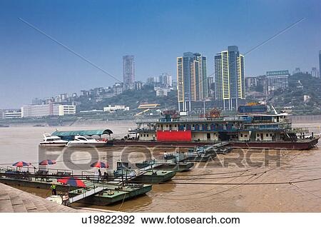 Stock Image - China, Chongqing, Convergence Of Two Rivers, Chaotianmen Pier. Fotosearch